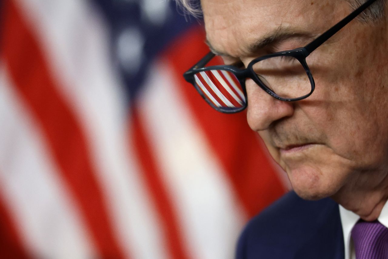 The U.S. flag is magnified in Federal Reserve Bank Chair Jerome Powell's glasses as he announces that interest rates will remain unchanged during a news conference at the bank's William McChesney Martin building on May 1 in Washington, DC.?