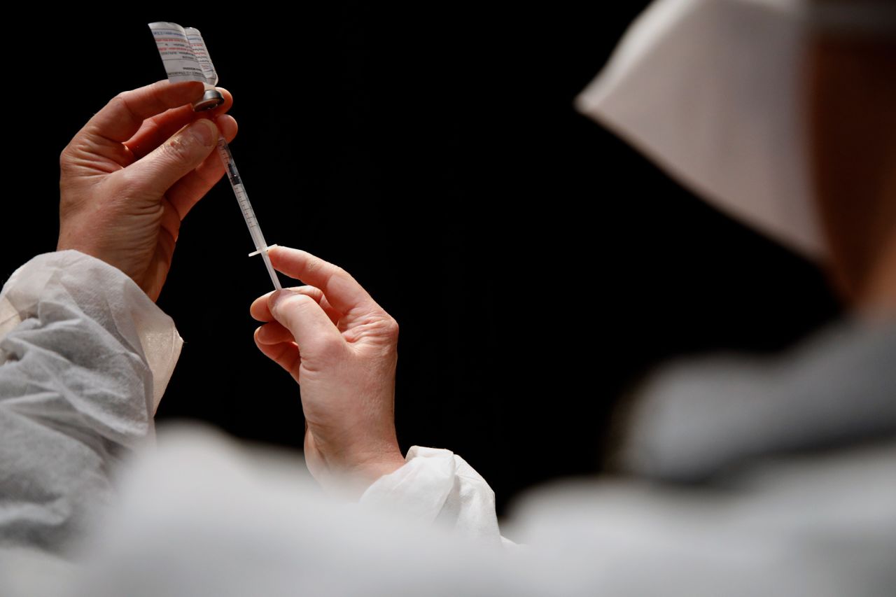 A nurse prepares the Moderna COVID-19 vaccine at a vaccination center in Schiltigheim, France, on January 28. 