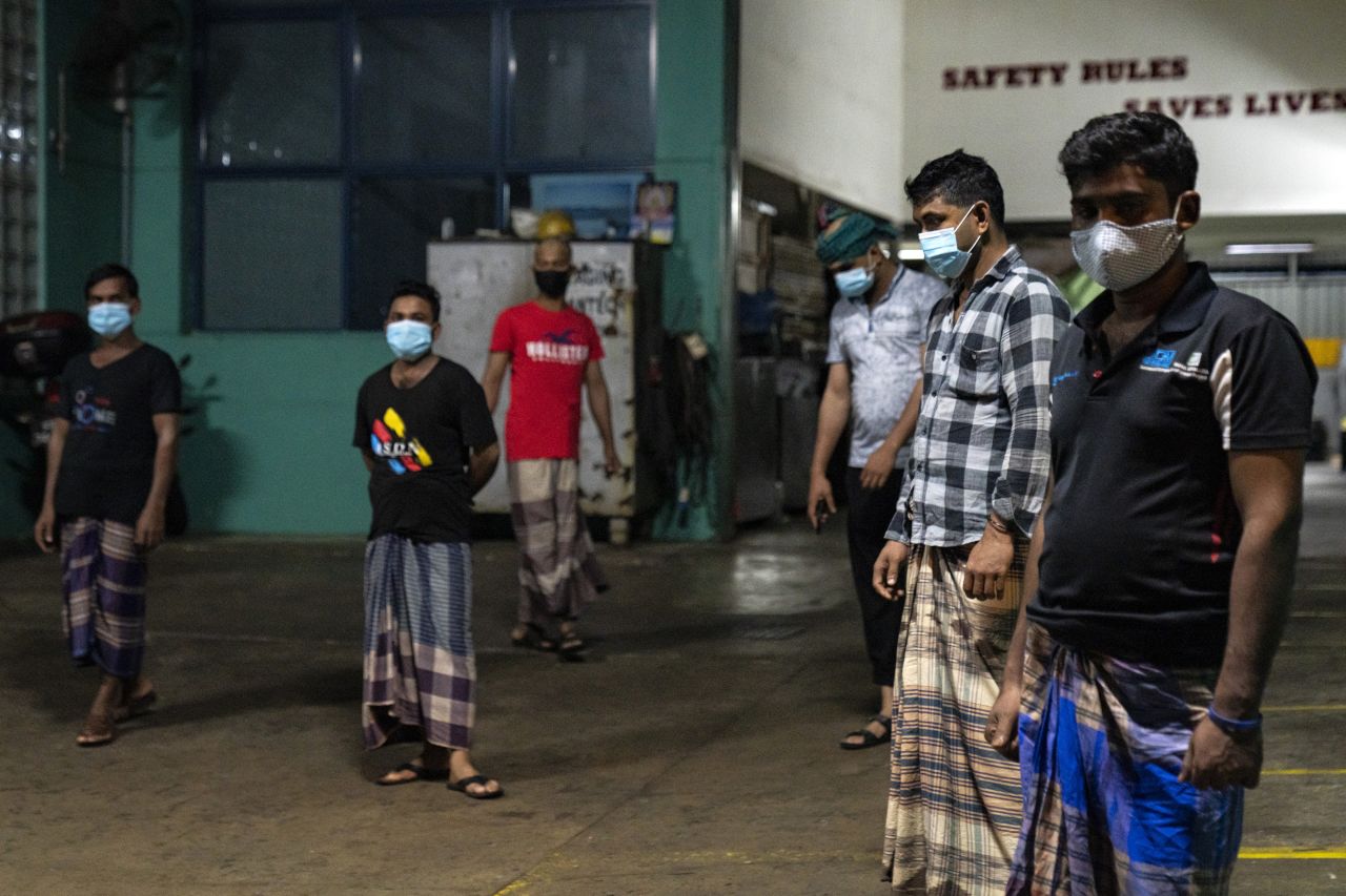 Migrant workers at a factory converted into a dormitory in Singapore on April 24.