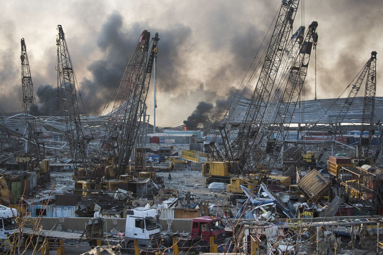 Smoke rises in the aftermath of a massive explosion in Beirut, Lebanon, on Tuesday, August 4. 