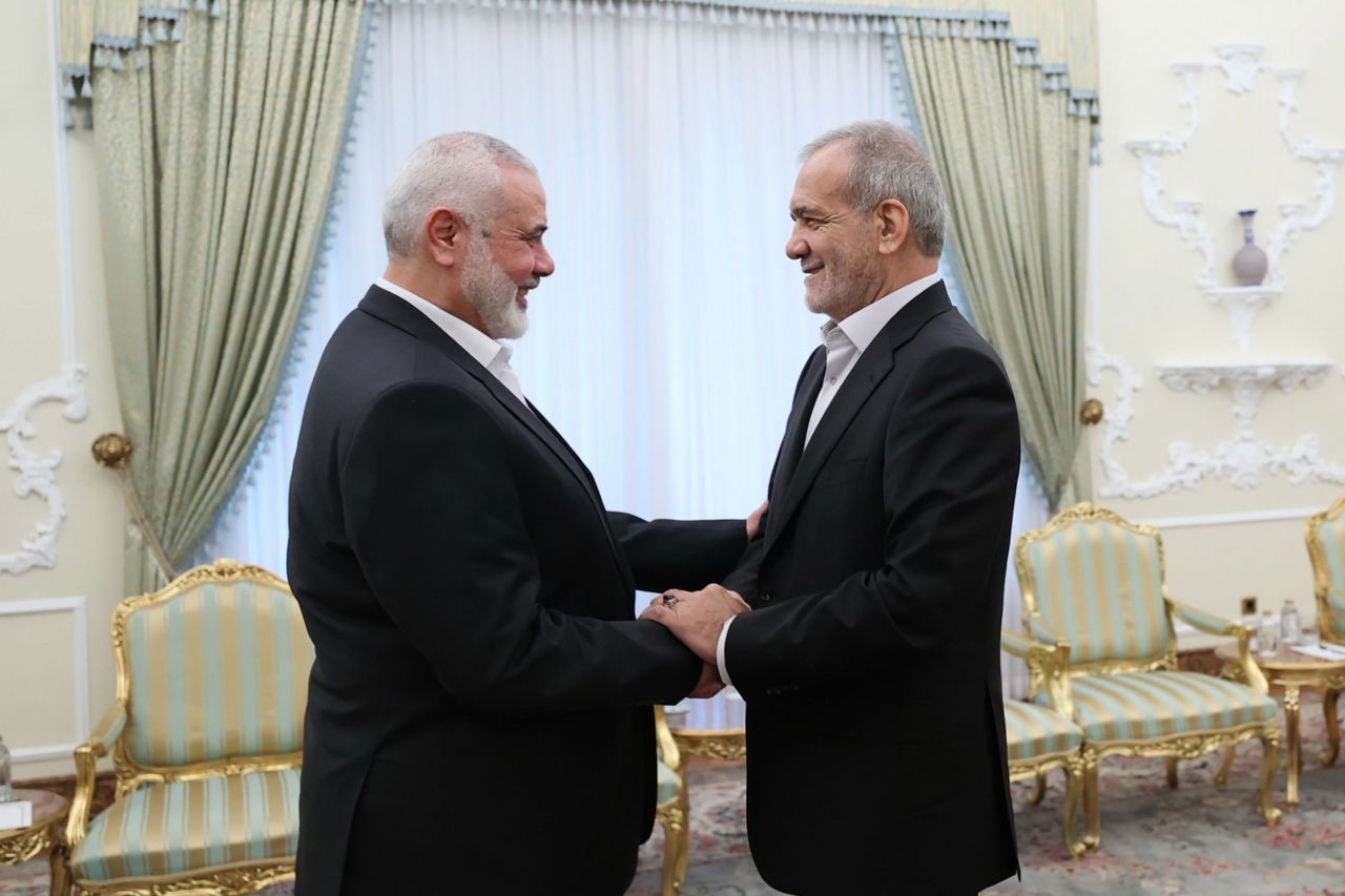 Hamas political leader Ismail Haniyeh, left, meets with Iranian President Masoud Pezeshkian, on July 30, in Tehran, Iran. Haniyeh was visiting Tehran this week for Pezeshkian's inauguration.