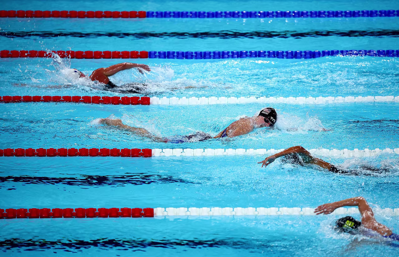 Katie Ledecky, second from top, enjoys a comfortable lead against her competitors in the 1,500 free.