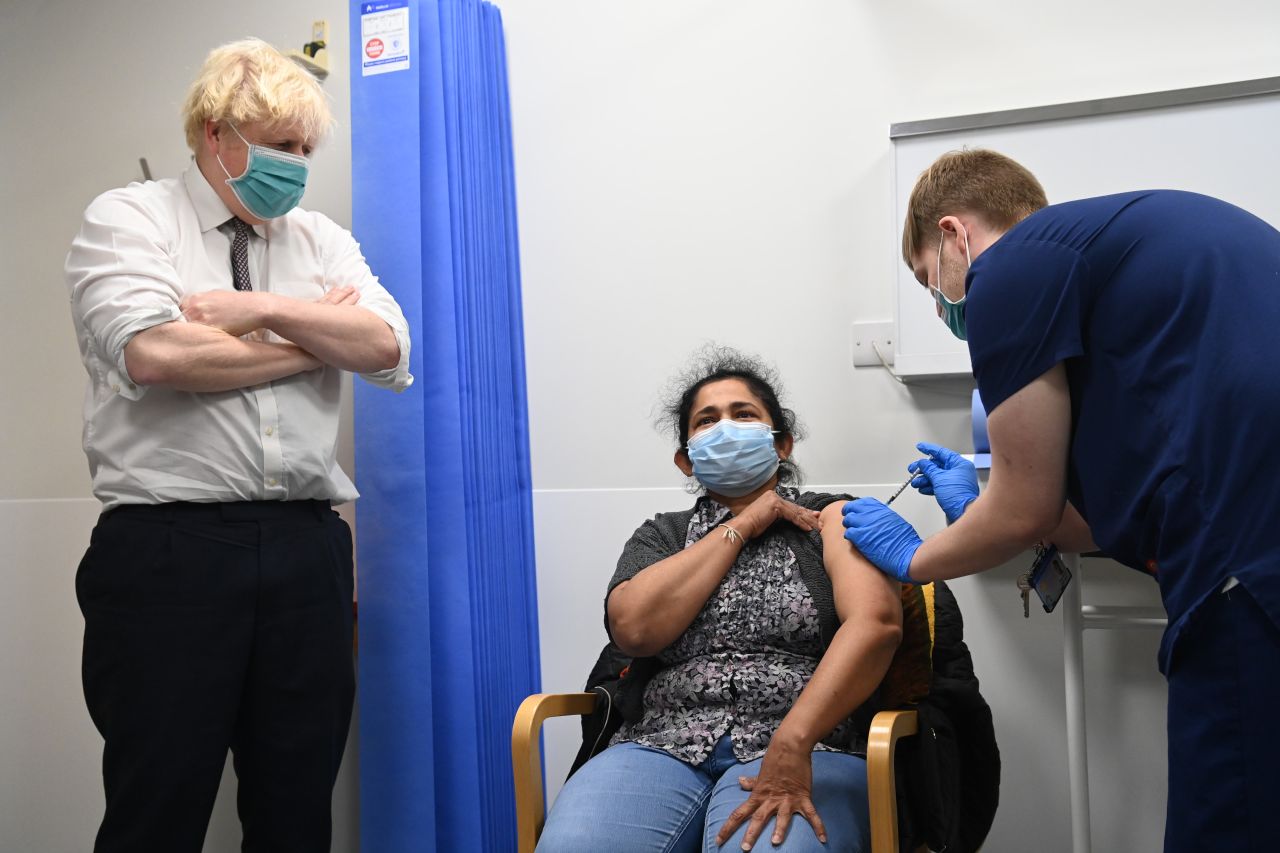 British Prime Minister Boris Johnson visits Lordship Lane Primary Care Centre on November 30, 2021 in London, England. During the visit the PM will meet staff and see people receiving their coronavirus (COVID-19) vaccine booster jab.?