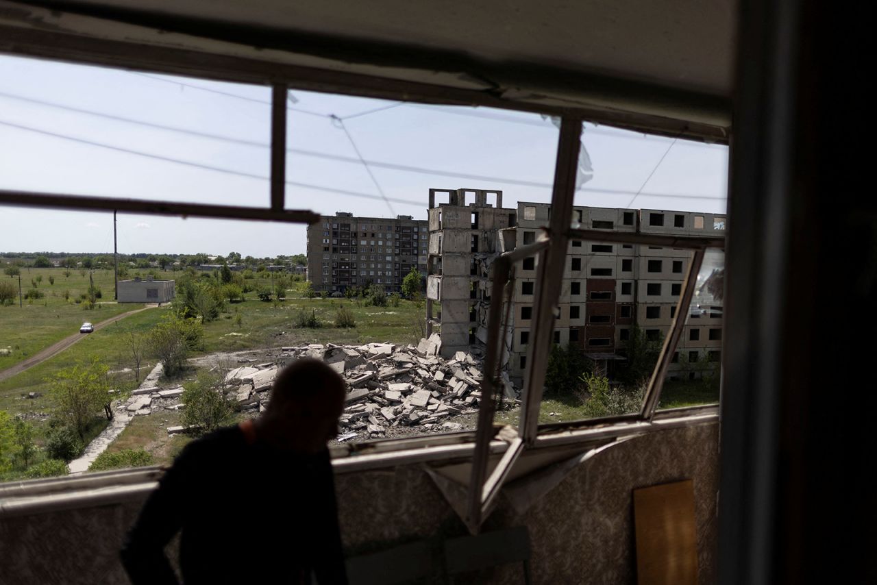 A man is seen inside his damaged apartment after a missile strike at a nearby abandoned building in the city of Kramatorsk, in the Donetsk region of Ukraine, on May 26.
