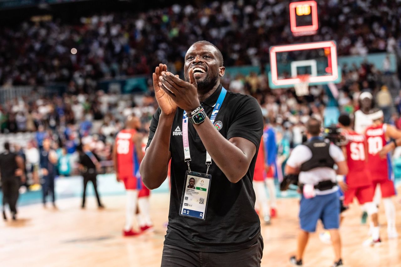 Luol Deng greets supporters after South Sudan's victory against Puerto Rico in Lille on July 28.