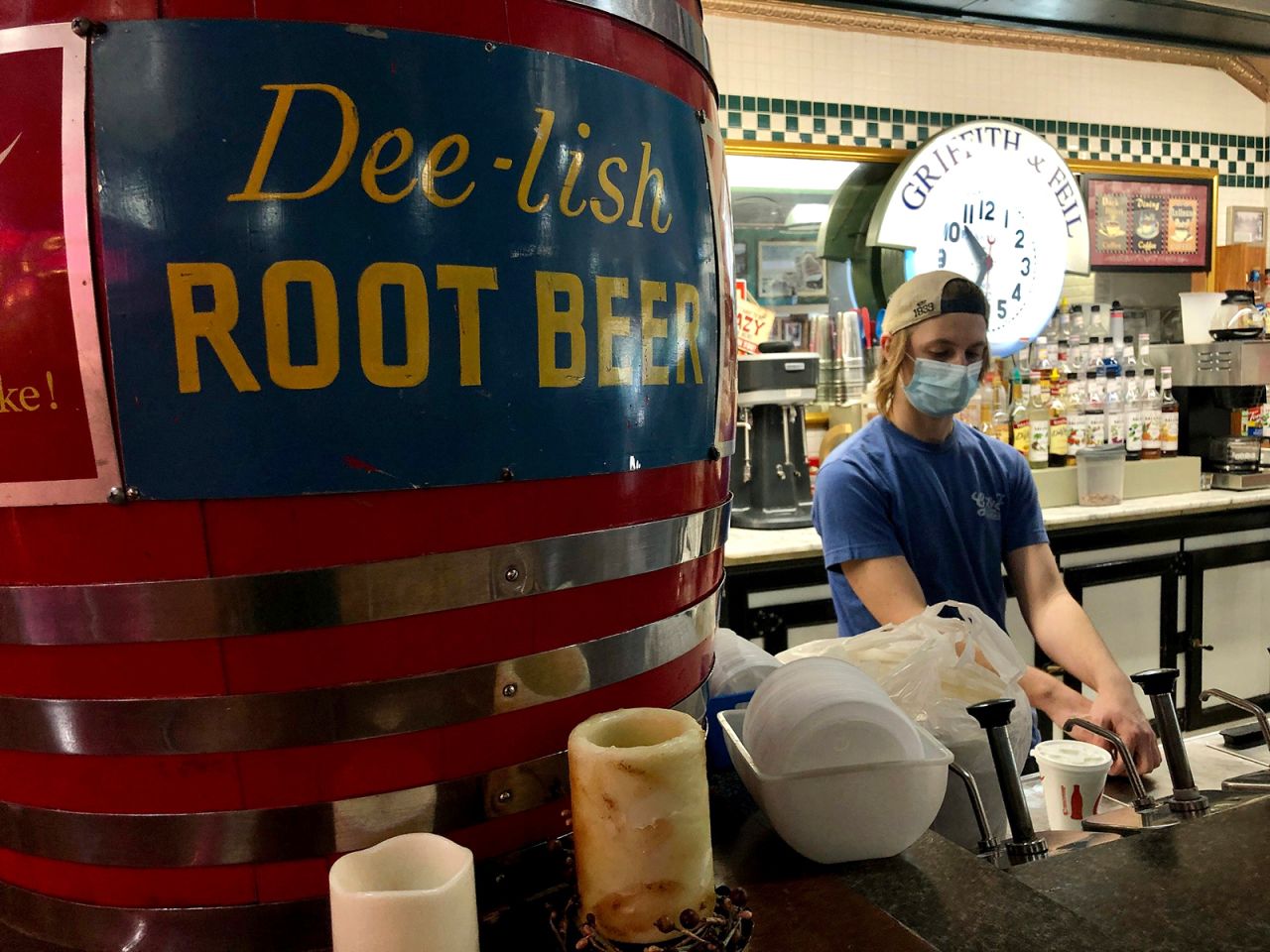 An employee works behind the food counter at the Griffith & Feil pharmacy on January 14, in Kenova, West Virginia.