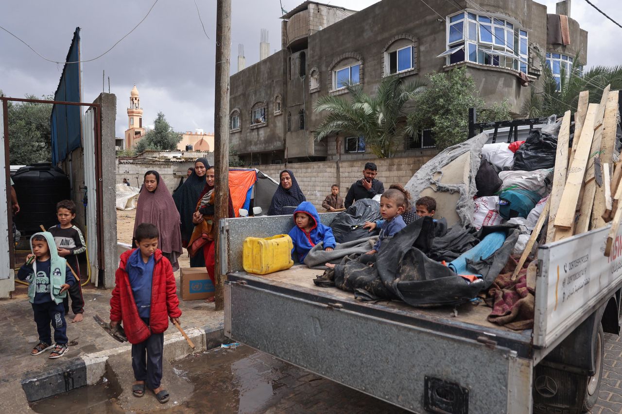 Displaced Palestinians pack their belongings following an evacuation order by the Israeli army, in Rafah, on May 6.
