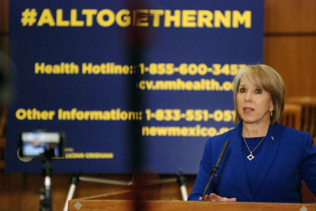 New Mexico Gov. Michelle Lujan Grisham speaks during a news conference on the floor of the state House of Representatives in Santa Fe, on Wednesday, March 18.