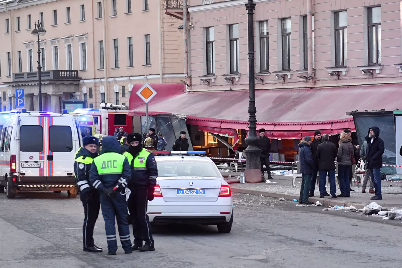 Russian police investigators inspect the scene of a blast in Saint Petersburg on April 2.