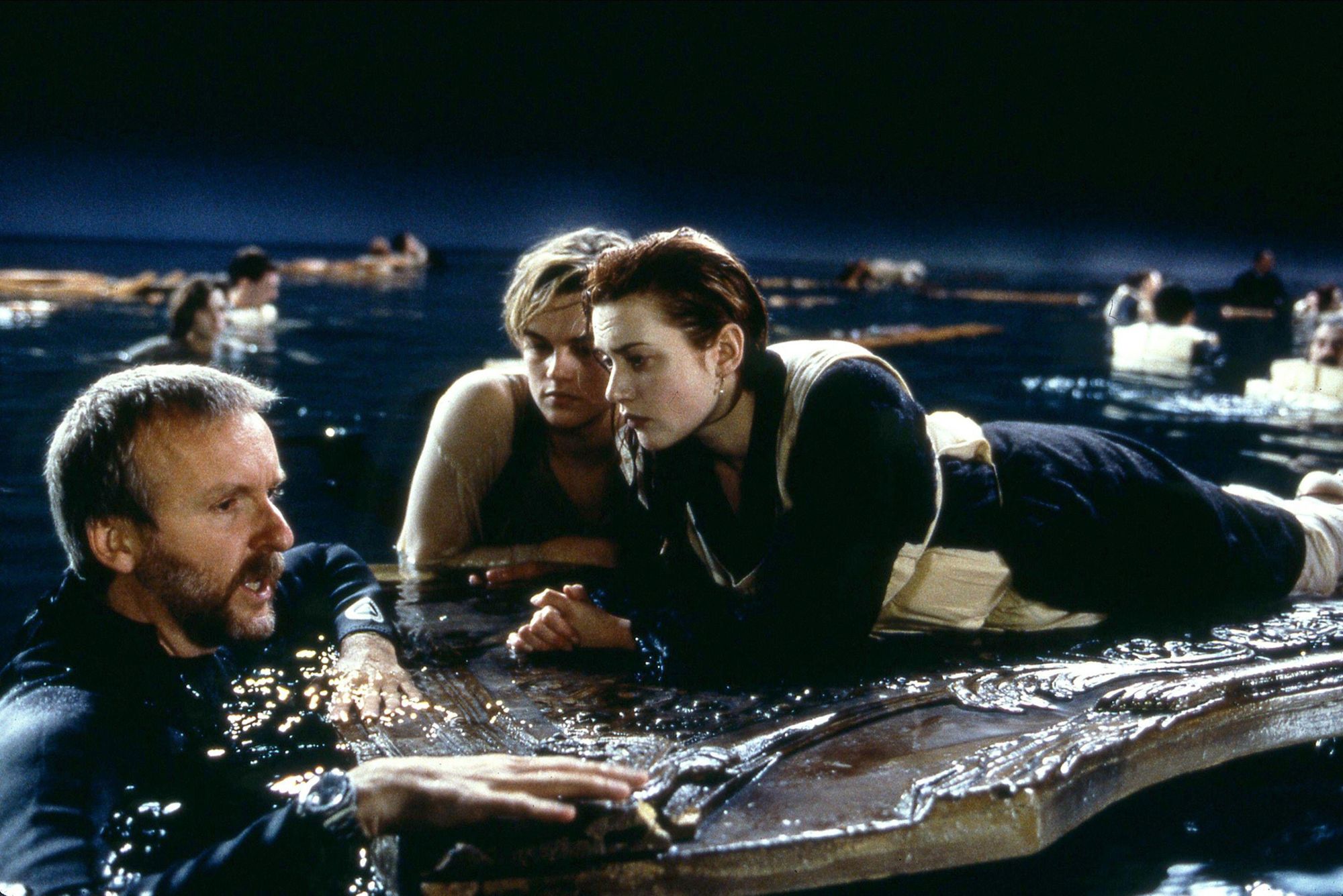 The floating wood panel that saved Rose DeWitt Bukater, but not Jack Dawson, in James Cameron's "Titanic" has sold for over $700,000 amongst other cinema memorabilia. Pictured above: Cameron directs Leonardo DiCaprio (Dawson) and Kate Winslet (DeWitt Bukater) on the fateful prop.