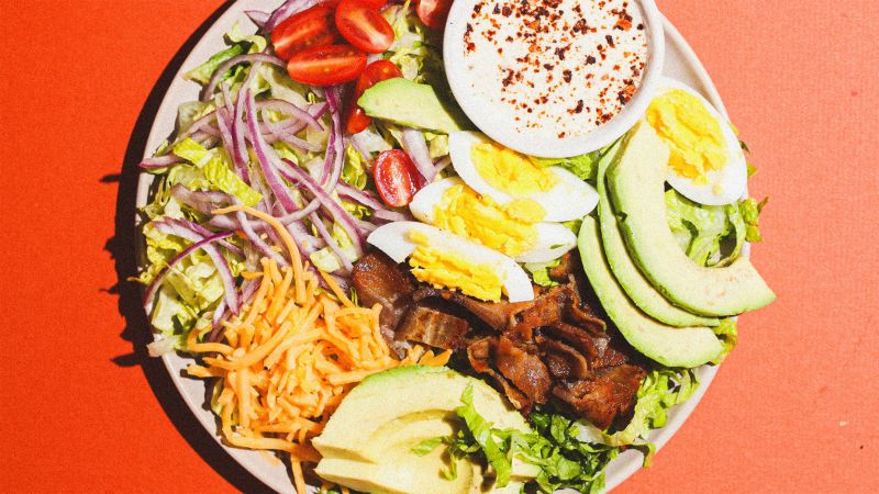Coleman made a fresh cheddar apple Cobb salad using his grocery hack.