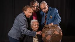 Pauline Baker, Daisy Whitner, John Williams, and Priscilla Williams Carolina, descendants of potter David Drake, at the Museum of Fine Arts, Boston, with one of the artist’s works. 
With art object:
Jar
Dave Drake (or Dave the Potter) (American, about 1800–about 1870)
1857
Stoneware with alkaline glaze
* Ethically borrowed from the Dave the Potter Legacy Trust LLC, established for the benefit of the artist's descendants
* Photograph © Museum of Fine Arts, Boston