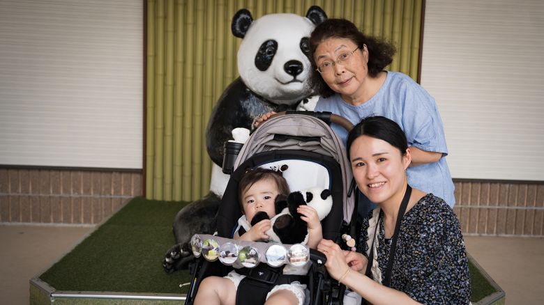 Grandmother Mihoko Ninomiya visits the pandas with her daughter and granddaughter.