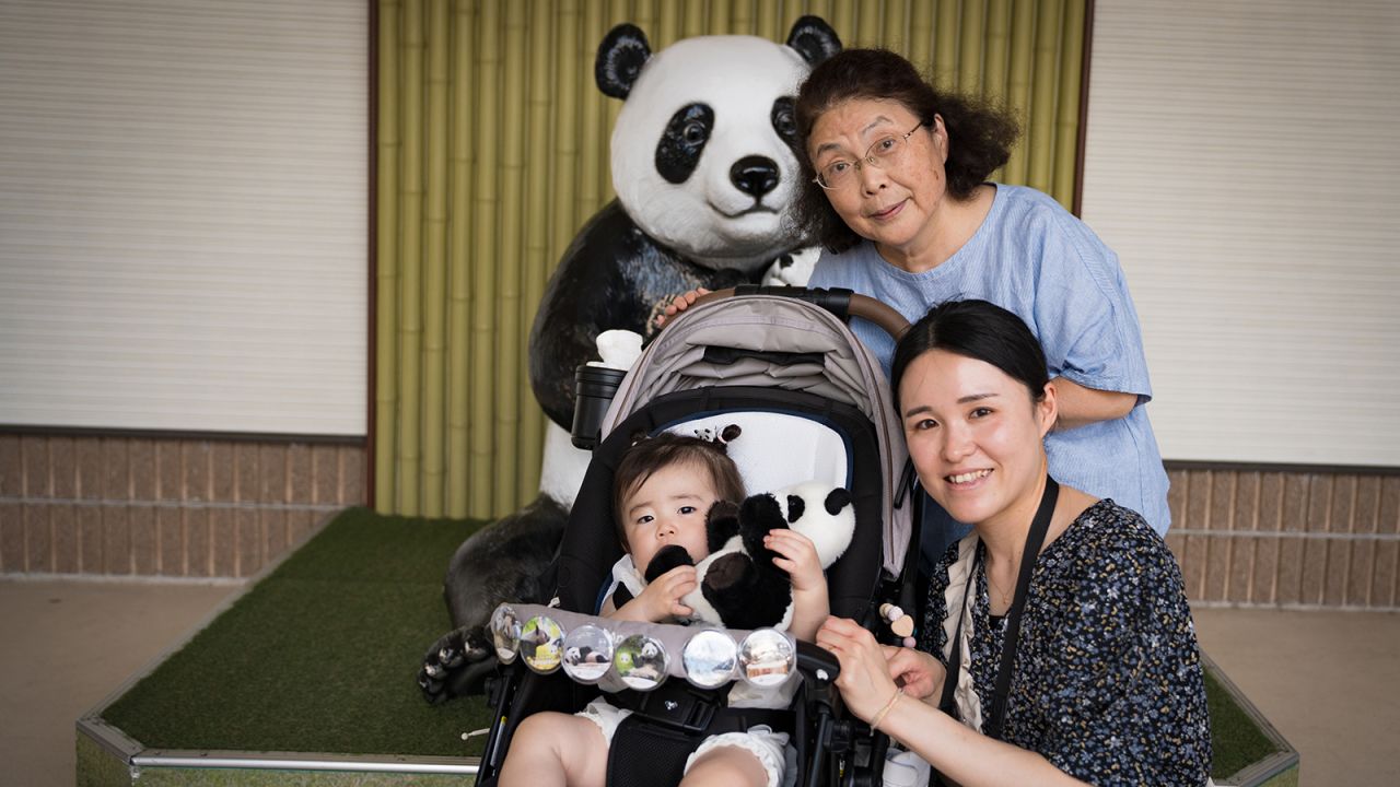 Grandmother Mihoko Ninomiya visits the pandas with her daughter and granddaughter.