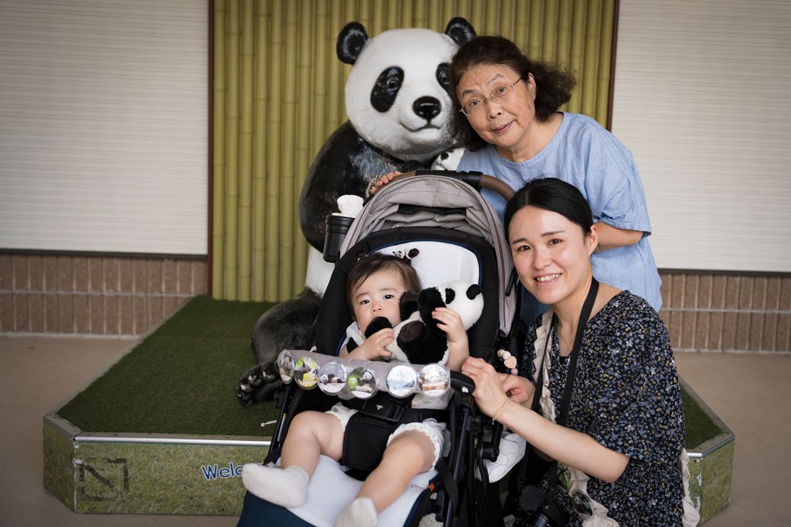 Grandmother Mihoko Ninomiya visits the pandas with her daughter and granddaughter.