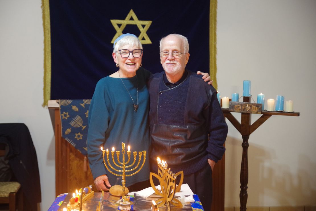 Rabbi Barbara has been married to Enrico, whom she first met back in 1975, for 14 years. They're shown here celebrating the Jewish holiday of Hanukkah.