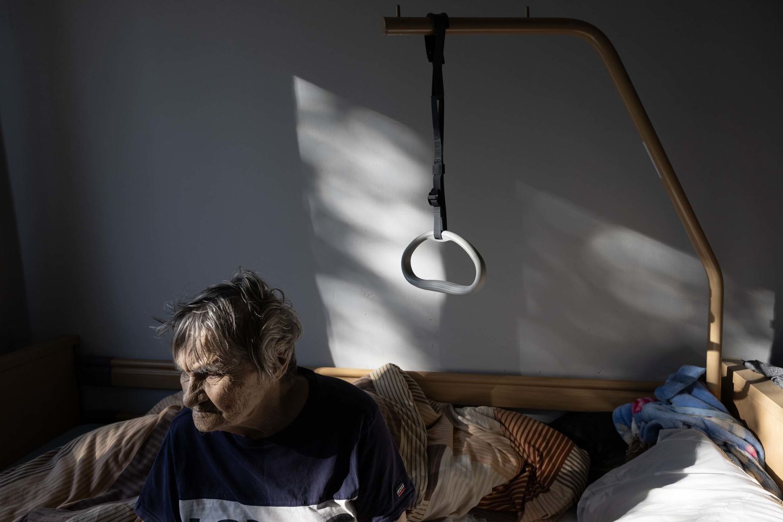 Galyna, 70, is seen at a nursing home in Kharkiv, Ukraine, on Friday, September 19. The war with Russia has strained Ukraine's ability to address many complex health issues. For the elderly, the air-raid sirens and explosions cause significant stress, especially when they are forced to relocate from their homes.