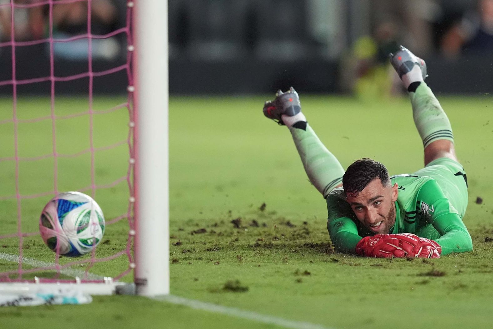 New England Revolution goalkeeper Matt Turner watches the ball get past him during a Major League Soccer game at Inter Miami on Saturday, October 4. Inter Miami won the match 4-1.