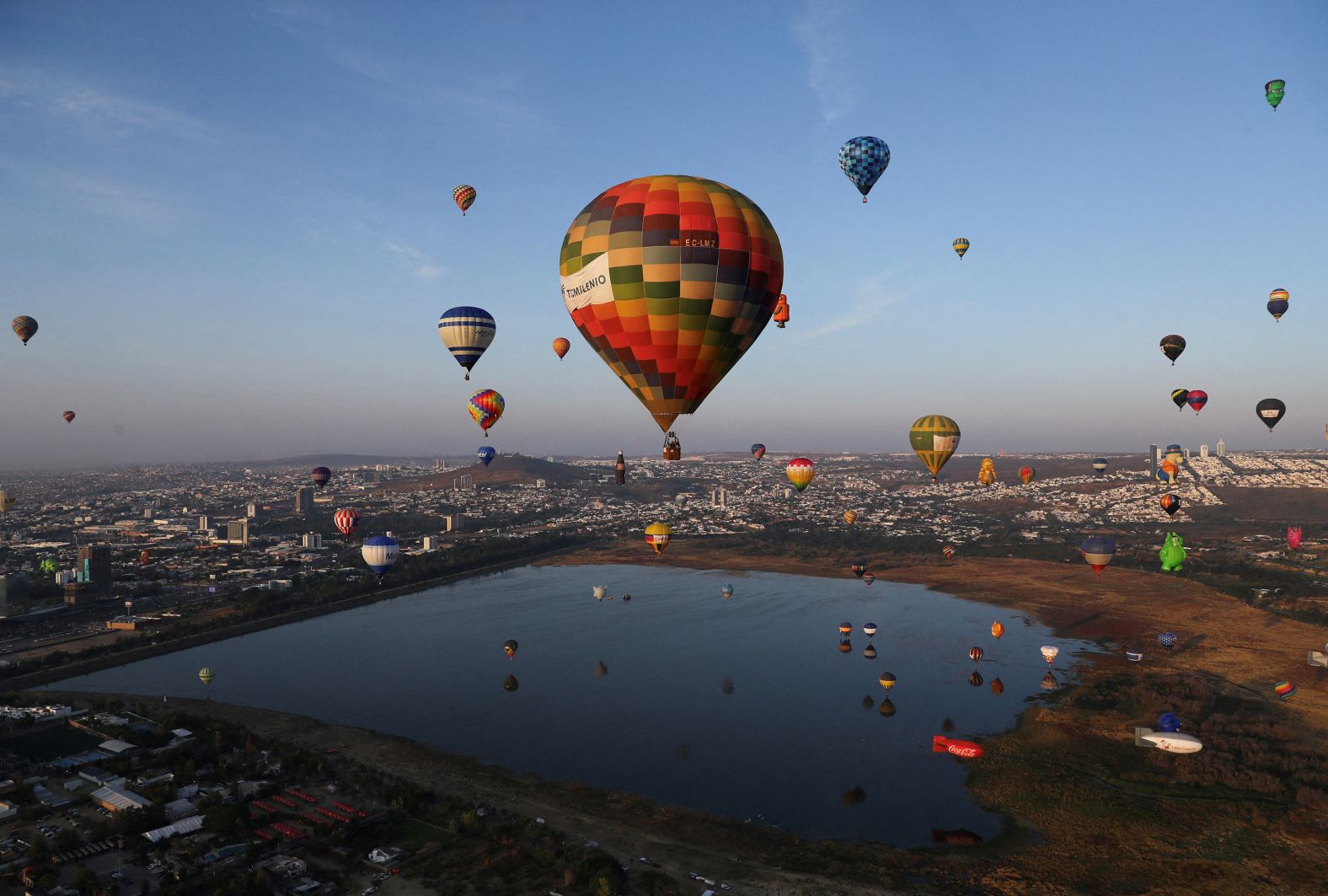 Hot-air balloons fly over the Metropolitan Park in León, Mexico, during the International Hot-Air Balloon Festival on Saturday, November 16.