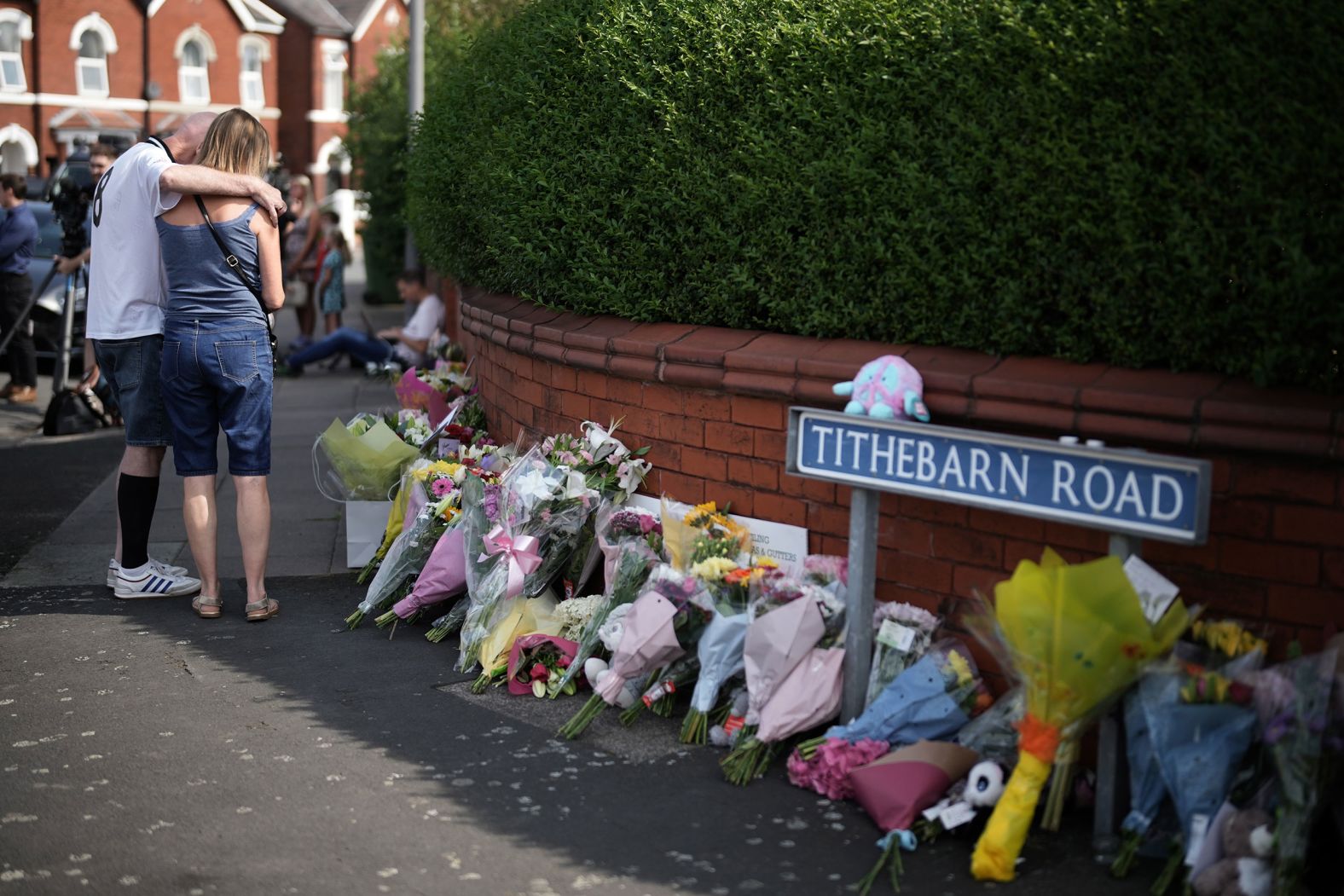 Tributes are left for the victims of a stabbing attack in Southport, England, on Tuesday, July 30. A teenage boy was charged with murder after <a href="index.php?page=&url=https%3A%2F%2Fwww.cnn.com%2F2024%2F08%2F01%2Fuk%2Fsouthport-stabbings-suspect-charged-murder-intl-hnk%2Findex.html">three young girls were killed in a stabbing attack</a> at a Taylor Swift-themed dance class. Eight other children and two adults were wounded in the attack.