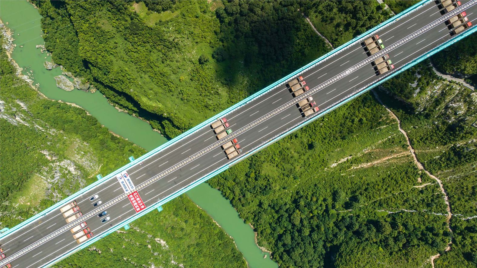 A key load test is completed on the Huajiang Grand Canyon Bridge, <a href="index.php?page=&url=https%3A%2F%2Fwww.cnn.com%2F2025%2F08%2F27%2Fworld%2Fvideo%2Fbridge-passes-load-test-ldndigvid">the world’s tallest bridge</a>, in southwest China on Monday, August 25. It’s scheduled to open next month.