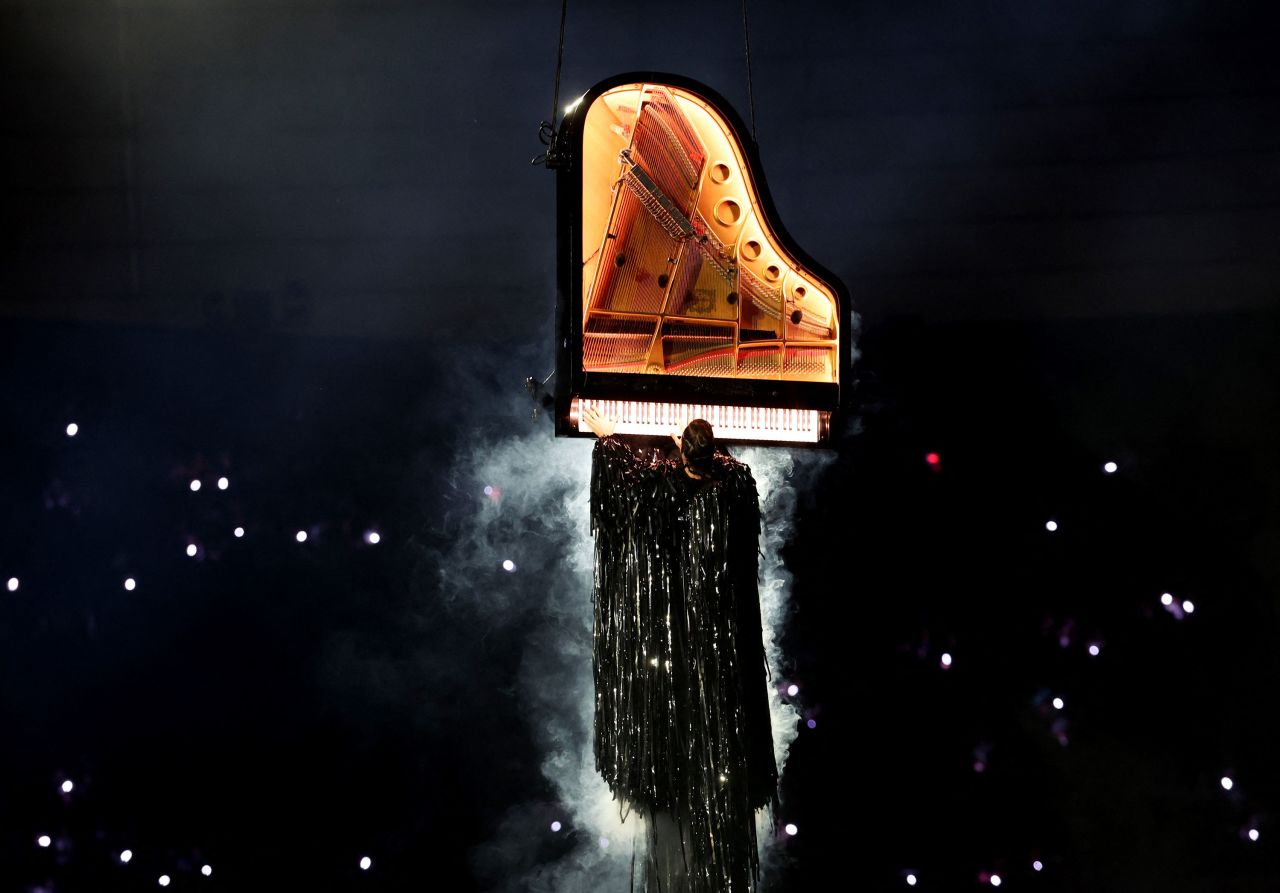 A pianist plays during the closing ceremony. 