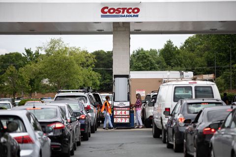 Cars line up to fill their gas tanks at a COSTCO at Tyvola Road in Charlotte, North Carolina on May 11.