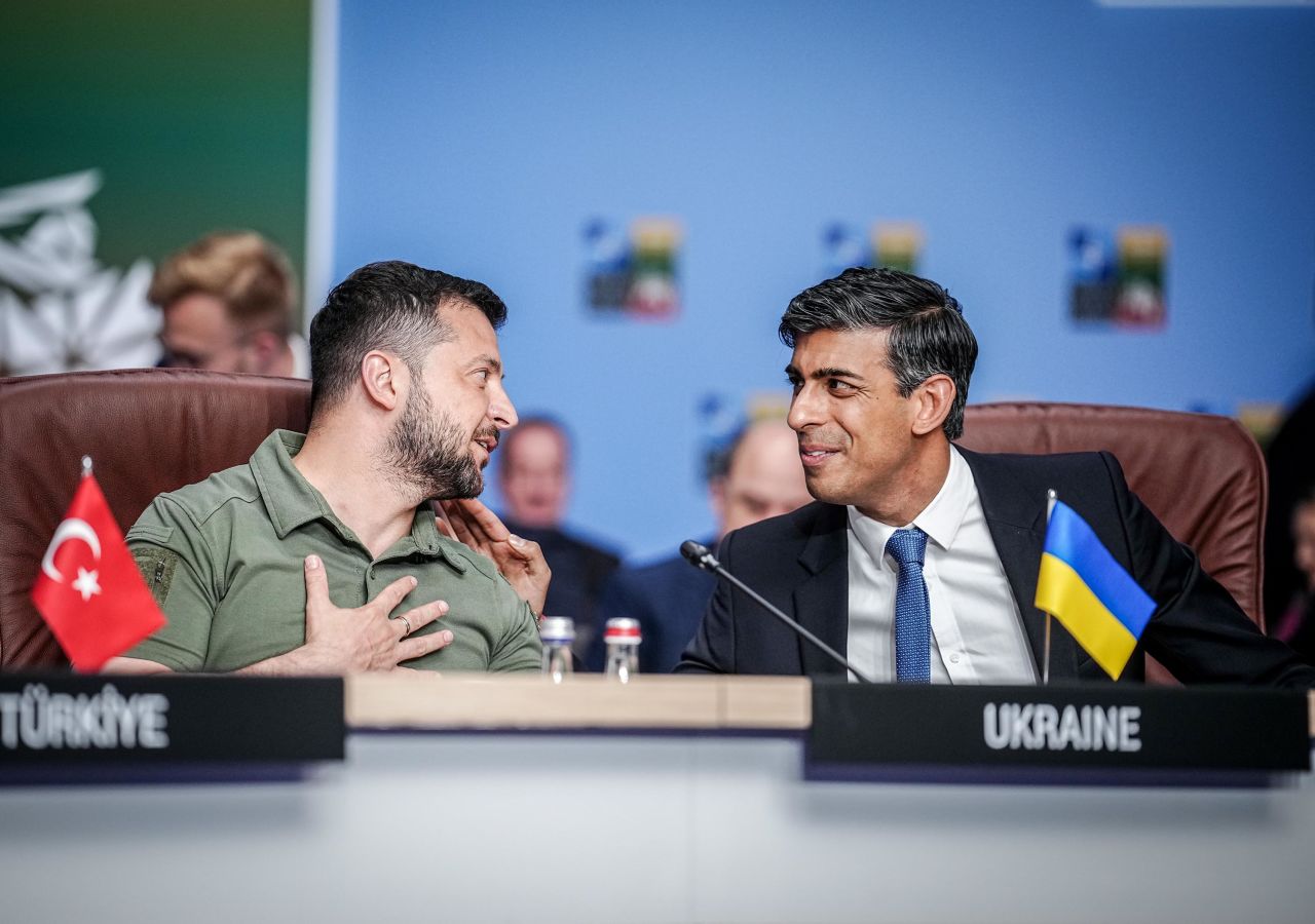Ukrainian President Volodymyr Zelensky and British Prime Minister Rishi Sunak are pictured speaking during the NATO-Ukraine meeting in Vilnius, Lithuania, on July 12. 