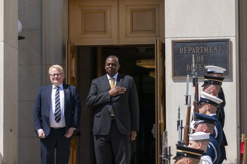 Swedish Defense Minister Peter Hultqvist, left, and Secretary of Defense Lloyd Austin stand during an enhanced honor cordon ceremony upon his arrival at the Pentagon today in Washington. 
