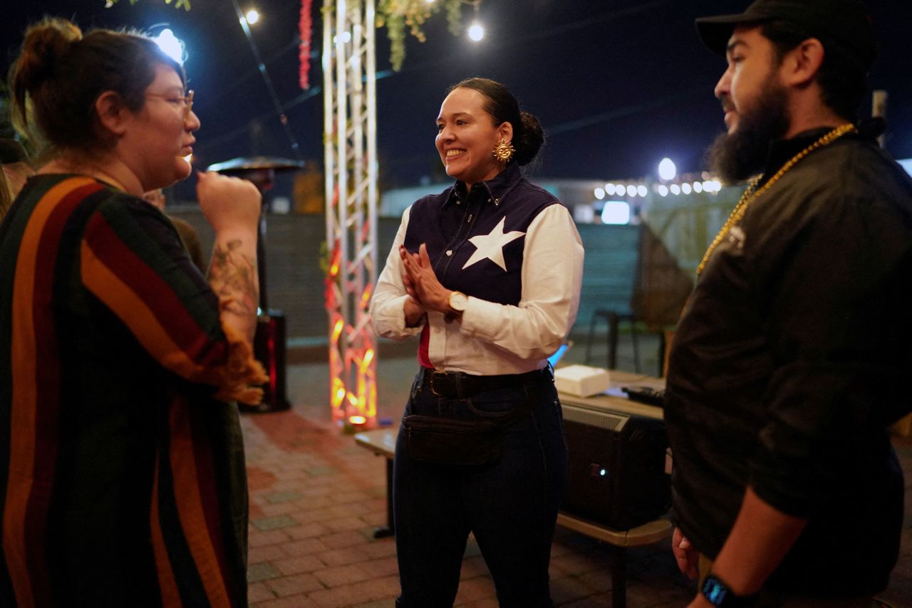 Michelle Vallejo talks to people in McAllen, Texas, in 2022.