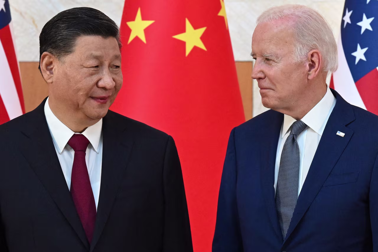 US President Joe Biden, right, and China's President Xi Jinping meet on the sidelines of the G20 Summit in Bali on November 14, 2022. 