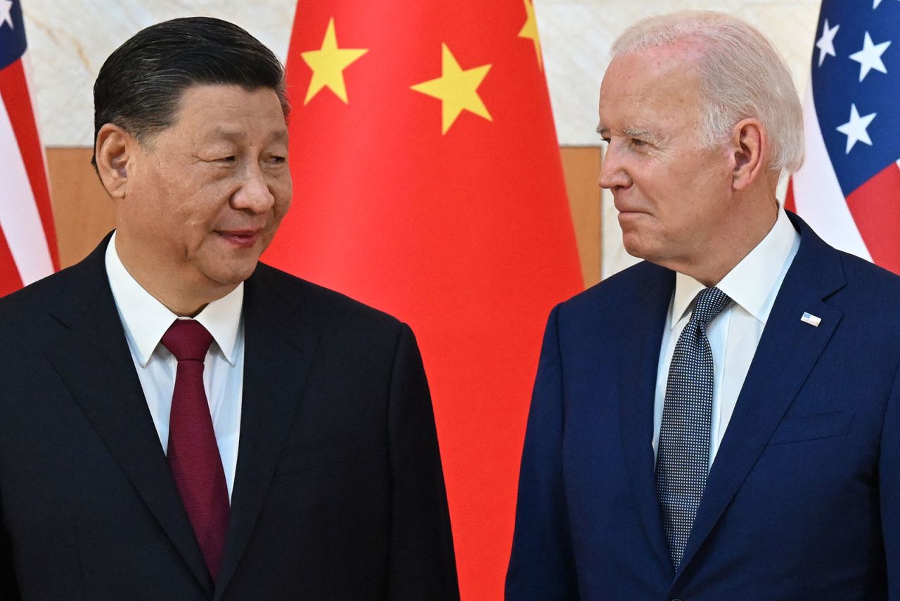 US President Joe Biden, right, and China's President Xi Jinping meet on the sidelines of the G20 Summit in Bali on November 14, 2022. 