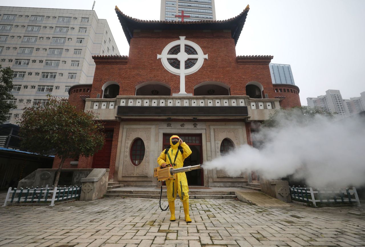 A worker disinfects the Hankou Salvation Church in Wuhan, China on March 6. 