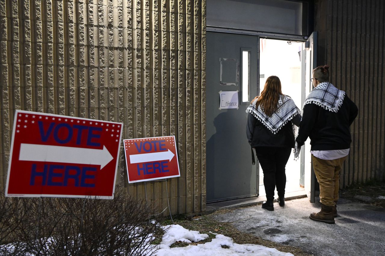 Voters enter the polling station inside the Bicentennial Elementary School in Nashua, New Hampshire, on Tuesday.