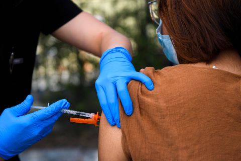 A health worker administers a Pfizer Covid-19 vaccine in Los Angeles, California, on May 14. 