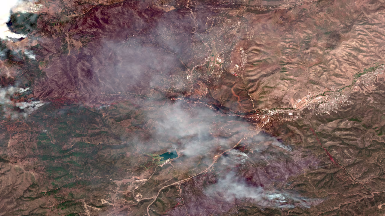 Wildfires burn near Ruidoso, New Mexico, on June 19. 