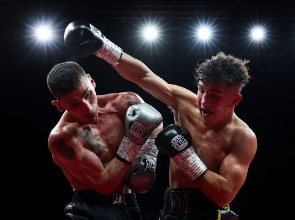 Tom Welland punches Reuquen Cona Facundo Arce during a bout in Newcastle upon Tyne, England, on Friday, June 6. Welland won on points.