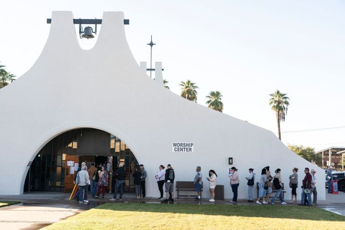 People line up to cast their votes in Phoenix on Tuesday.