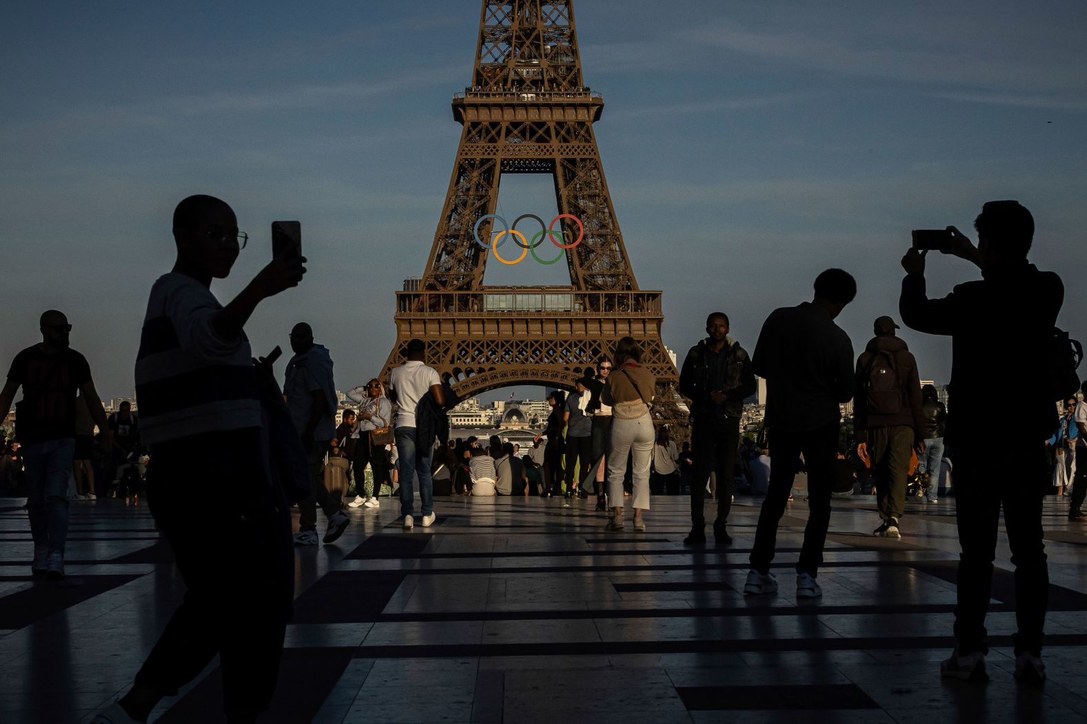 The Olympic rings are seen on the Eiffel Tower in Paris on Friday, June 7. The Paris Olympics start next month.