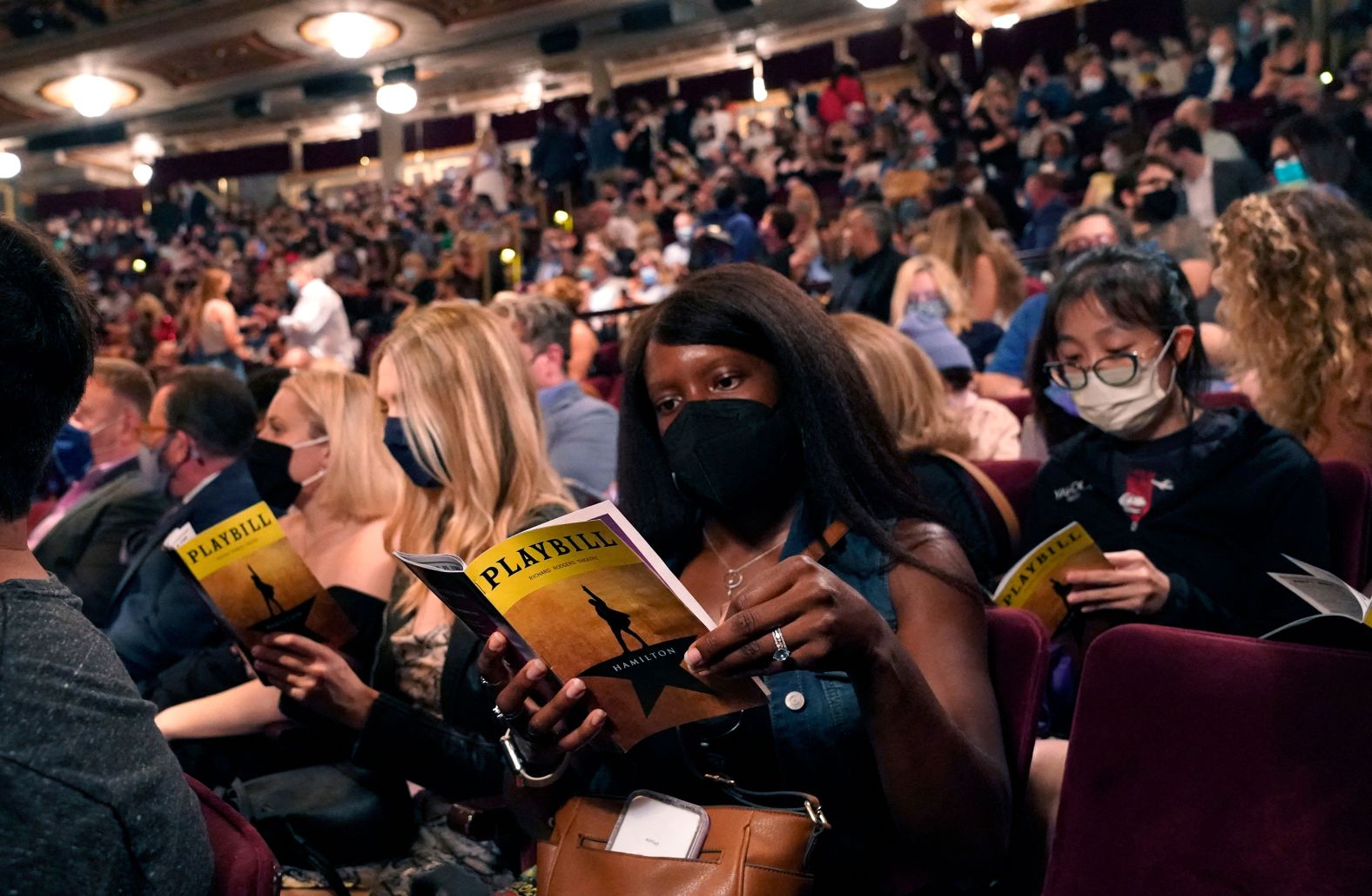Audience members wear masks in September 2021, when "Hamilton" returned to Broadway after 18 months.