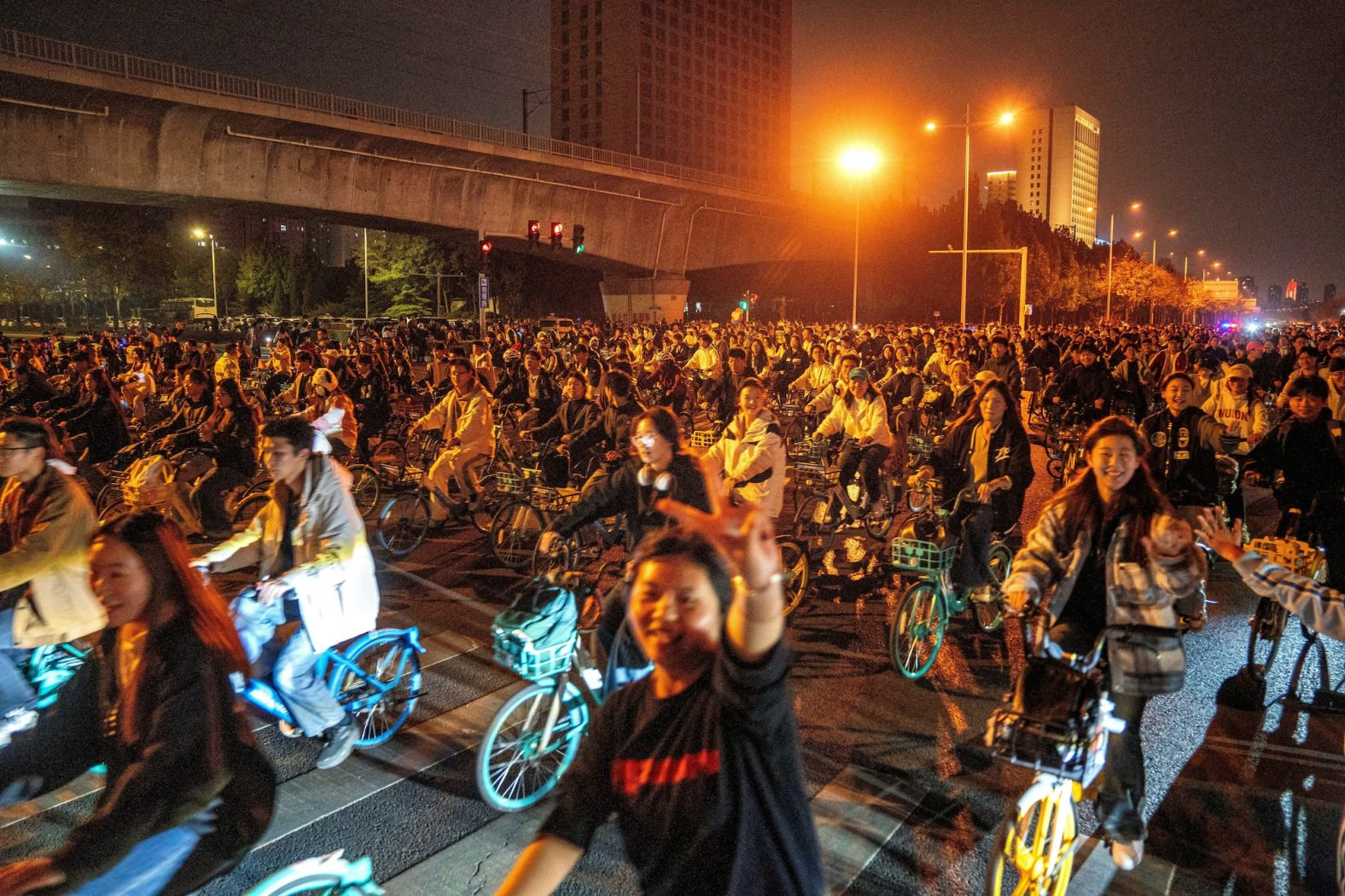 College students ride bicycles in Zhengzhou, China, on Saturday, November 9. Nighttime bike rides to Kaifeng, an ancient city known for its historic sites and soup dumplings, have been all the rage among college students in Zhengzhou – a trend initially encouraged by the government as it sought to promote local tourism. But now, <a href="index.php?page=&url=https%3A%2F%2Fwww.cnn.com%2F2024%2F11%2F11%2Fchina%2Fchina-kaifeng-night-bike-craze-crackdown-intl-hnk%2Findex.html">officials are scrambling to curb the craze</a>, deploying police and closing bike lanes, after its popularity appears to have gotten out of hand. Tens of thousands of cyclists brought intercity traffic to a standstill, while piles of discarded bikes overwhelmed the streets of Kaifeng, leaving commuters in Zhengzhou struggling to find bikes to ride home.