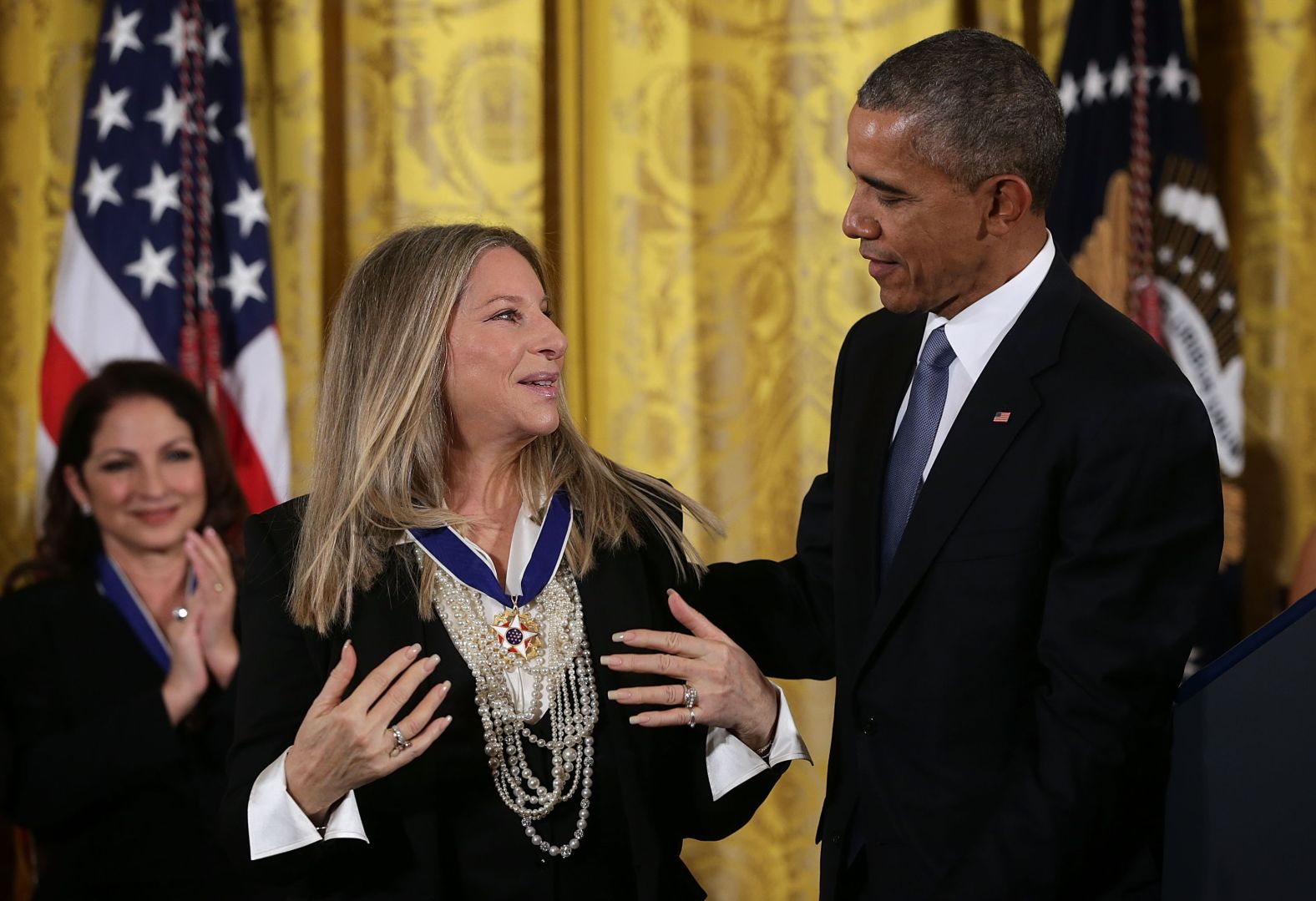 President Barack Obama presents the Presidential Medal of Freedom to Streisand in 2015.