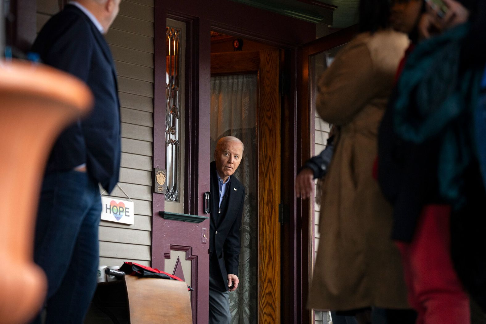 Biden looks out at a crowd as he arrives to greet people during a campaign event in Saginaw, Michigan, on March 14.