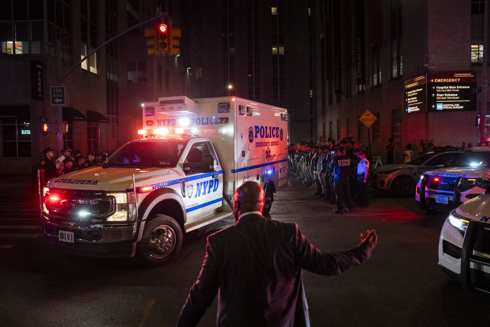 Members of the New York Police Department gather for the transfer of Didarul Islam, a fellow officer who was killed in a mass shooting in Midtown Manhattan on Monday, July 28.