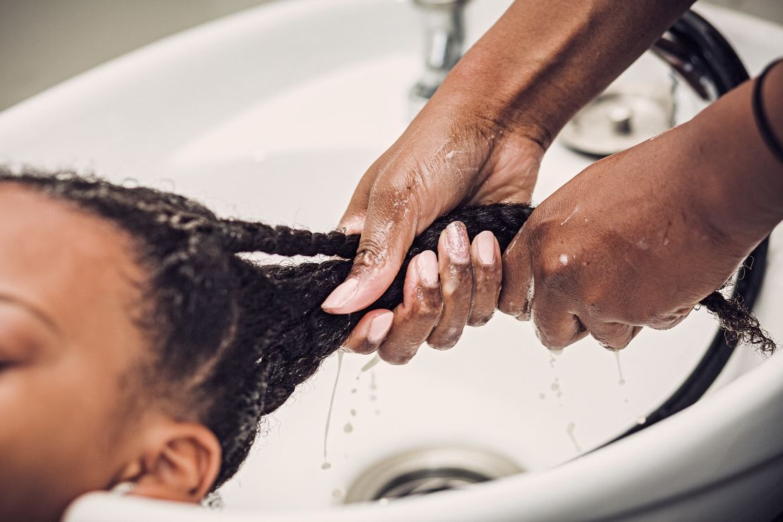 One mother, Kameron, taught Faxio a game-changing wash day "hack" — "detangling then braiding (or twisting) hair before washing it to reduce tangling," she writes.