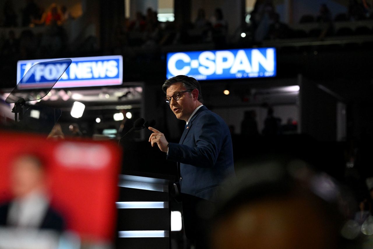 House Speaker Mike Johnson speaks on stage during the second day of the convention on Tuesday, July 16, in Milwaukee. 