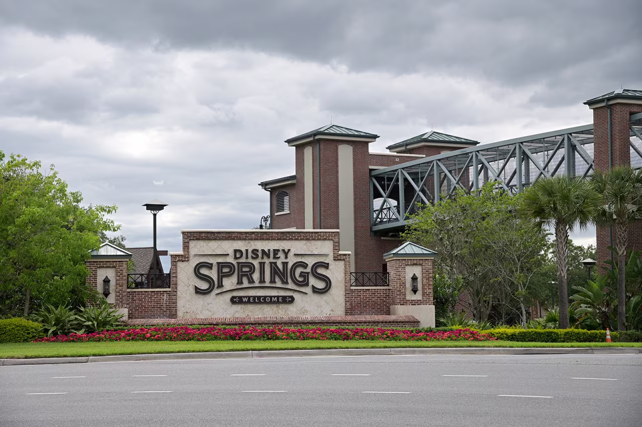 An empty street is viewed in front of the Disney Springs shopping and entertainment district, on Monday, April 6, in Lake Buena Vista, Florida.