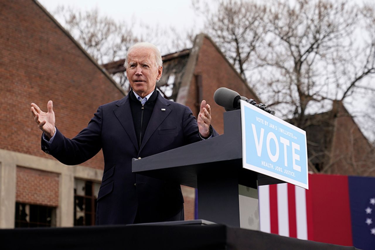 President-elect Joe Biden speaks at a drive-in rally for Georgia Democratic candidates for US Senate Raphael Warnock and Jon Ossoff, Tuesday, December 15, in Atlanta. 