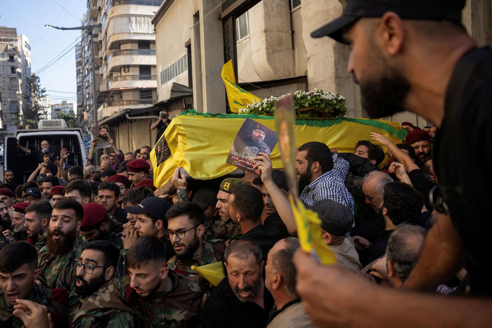 Members of Hezbollah carry the coffin of Fu’ad Shukr, a senior commander in the militant group, in the southern suburbs of Beirut, Lebanon, on Thursday, August 1. <a href="index.php?page=&url=https%3A%2F%2Fwww.cnn.com%2F2024%2F07%2F30%2Fmiddleeast%2Fbeirut-explosion-hezbollah-stronghold-intl-latam">Shukr was killed by a targeted Israeli strike in Beirut</a>, Israel said.