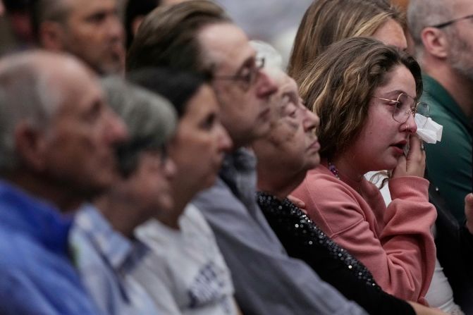 Emily Birger wipes away tears during a vigil for Sarah Milgrim and Yaron Lischinsky in Overland Park, Kansas, on Thursday, May 22. Milgrim and Lischinsky, two Israeli Embassy staff members, <a  target="_top" href="/newspapers?url=https://www.cnn.com/2025/05/22/us/lischinsky-milgrim-israel-embassy-shooting">were fatally shot last week</a> after leaving an event at the Capital Jewish Museum in Washington, DC.